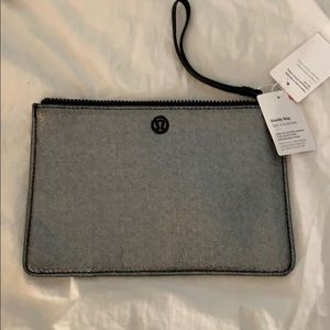 NWT lululemon goody bag - silver/black wristlet